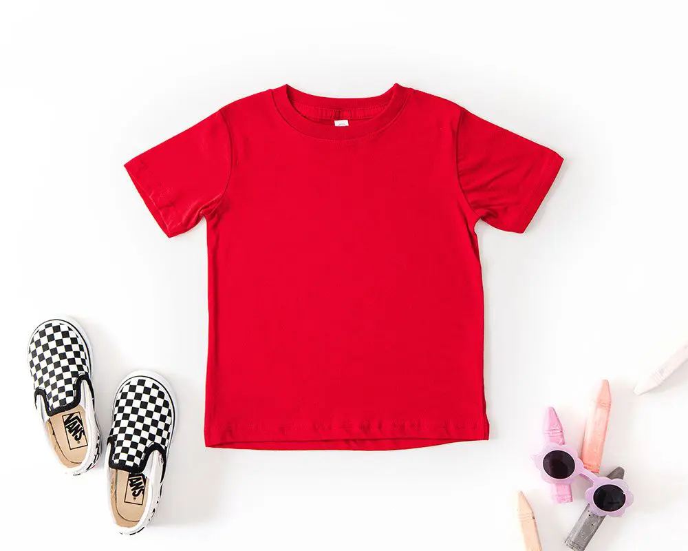 Red t-shirt flat lay with checkerboard shoes